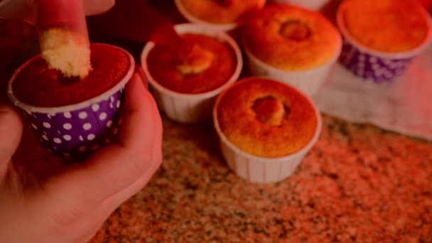 Small Cupcakes Table Unrecognizable Woman Makes Hole Cupcake Fills Jam — Vídeo de Stock