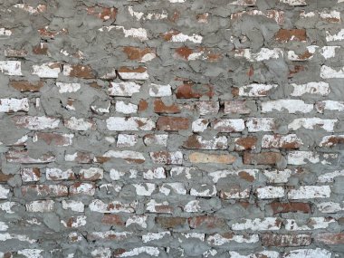 Betonlu tuğla dokusu. Eski duvarcılığın arka plan dokusu. Sert tuğla duvarı. Kapatın. Metnin için arkaplan kavramı