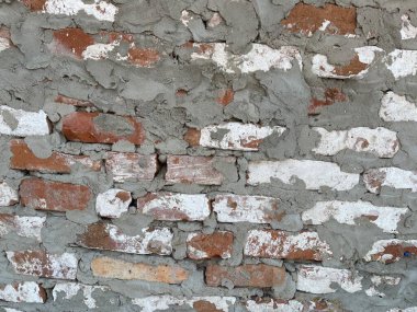 Betonlu tuğla dokusu. Eski duvarcılığın arka plan dokusu. Sert tuğla duvarı. Kapatın. Metnin için arkaplan kavramı