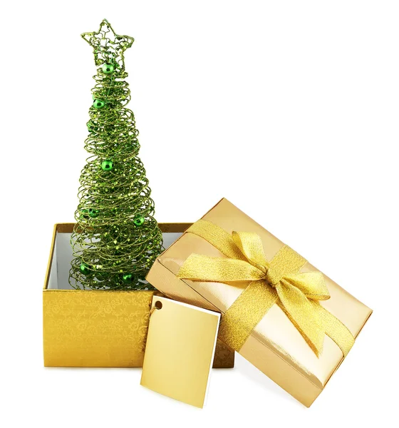 Julgran i gyllene box med rosett — Stockfoto