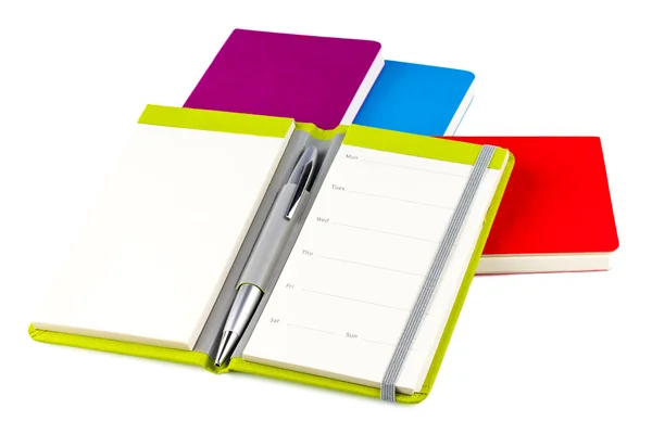 Cuadernos de colores con bolígrafo — Foto de Stock