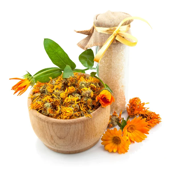 Bowl with flowers of marigold and sea salt — Stock Photo, Image