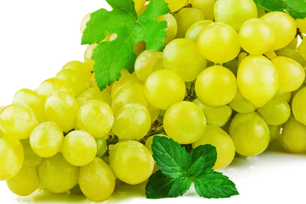 Part of bunch of grapes with green leaf — Stock Photo, Image