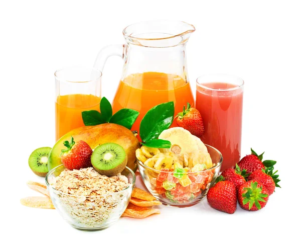 Breakfast ingredients with juice and fresh fruit — Stock Photo, Image