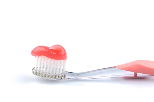 Toothbrush with toothpaste Royalty Free Stock Photos