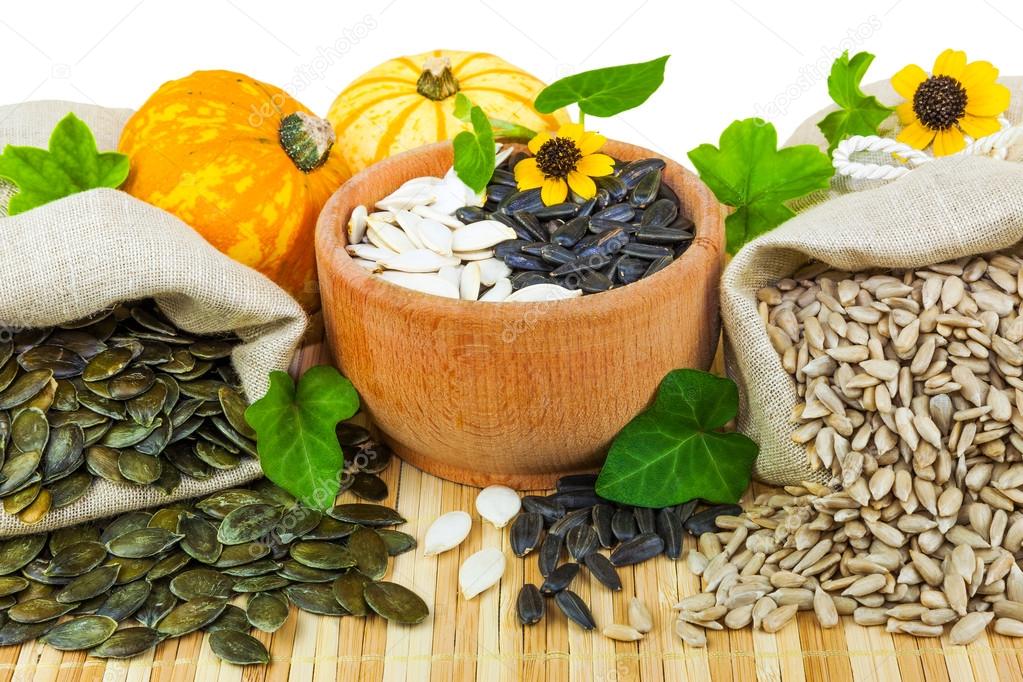 Тыквенные и подсолнечные семечки. Семечки подсолнечника и тыквы. Семечки подсолнуха и тыквы. Китайские тыквенные семечки. Семена тыквы и подсолнечника.