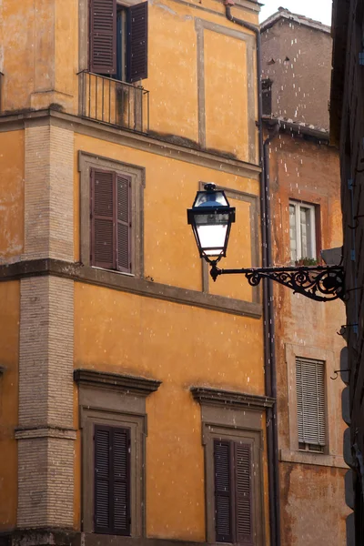 Facades old medieval stone with street lamp in city Rome Italy — Stock Photo, Image