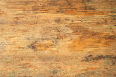 Eski ahşap masa arka planı. Kaba ahşap yüzeyi, dokusu ve lekeleri var. Boşluğu kopyala.