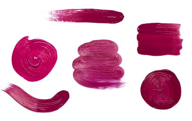 Kırmızı fırça ruju ya da beyaz arka planda boya. Dekorasyon ve tasarım için kozmetik veya akrilik lekeler.