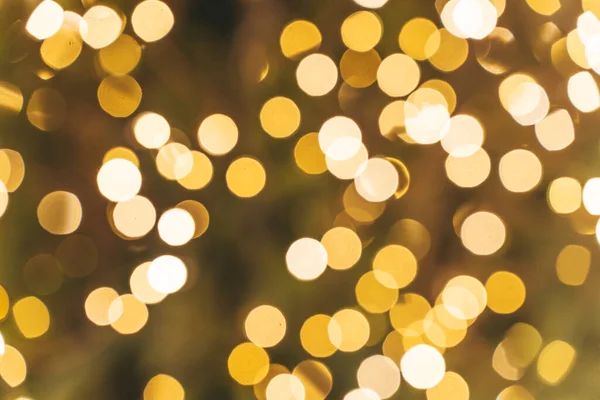 Fondo bokeh dorado. Lámina de textura y confeti bokeh, luz de polvo dorado. Fiesta festiva Navidad y año nuevo fondo víspera. —  Fotos de Stock