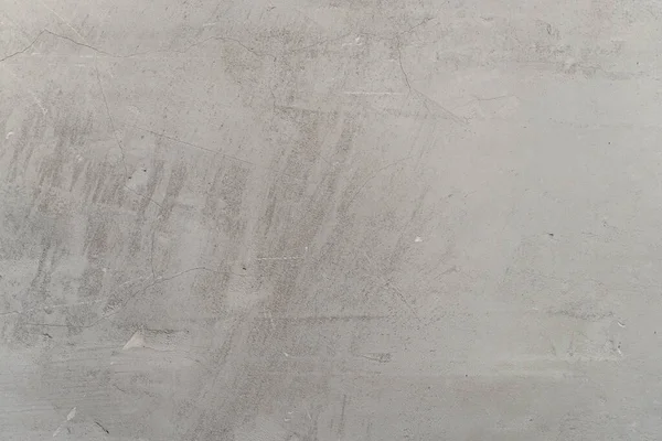 Betonowe tło ścian. Struktura kamienia szarego i nieobrobiona powierzchnia ściany przed wykończeniem. — Zdjęcie stockowe