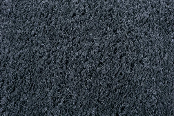 Textura koberce pozadí. Černý šedý bavlněný koberec na podlahové krytiny. Materiál pro design interiéru a dekoraci obytných místností — Stock fotografie