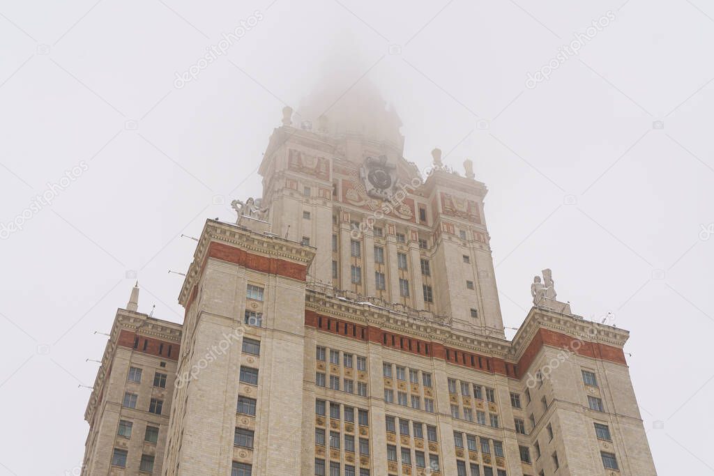 The Lomonosov Moscow State University in winter. Education in Russia, Stalinist architecture, Soviet Empire style concept