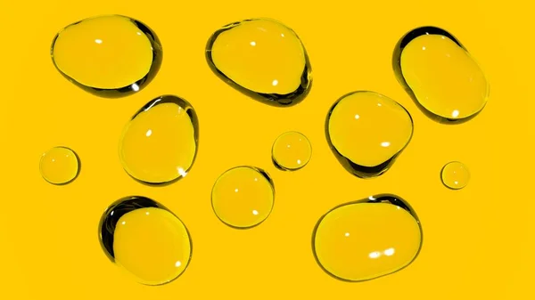 Voda nebo olej kapky izolovat. Průhledné kapky nebo bubliny kapaliny na prázdném žlutém pozadí. — Stock fotografie