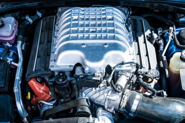 Engine of a modern car. Device and detailing of the transport motor.Automotive, motors, manufacturing concept. High quality photo