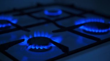 Gas blue stove flame. Use of propane butane in the European Union for kitchen and home heating. Oil and gas industry, crisis, resources, economy concept. High quality FullHD footage