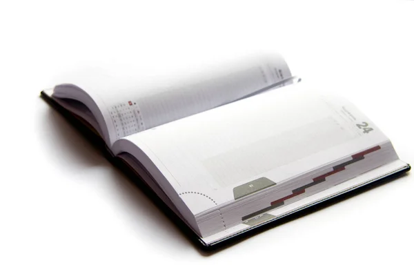 Zakelijk dagboek met pen op een witte achtergrond — Stockfoto