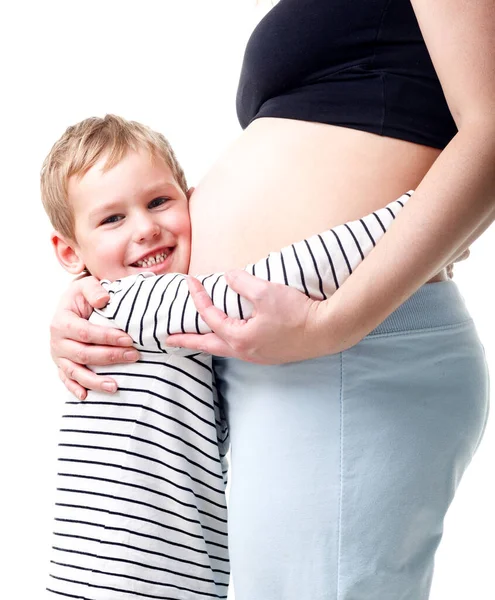 Little girl with her mother pregnant Stock Photo