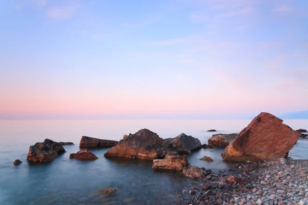 Sea rocks at sunset. Breathtaking sunset view on the Black Sea coast, Crimea. — Stock Photo, Image