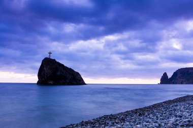 Dramatic sunset over the Black Sea and the rocks of Cape Fiolent Crimea, Ukraine
