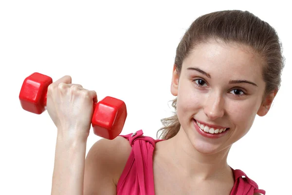 Fitness antrenmanı. Bisiklet Çıtırdatan Sporcu Kadın Pembe ve Mavi Neon Stüdyo Arkaplanı Üzerinde Yerde Uyurken Abur cubur Egzersizi Yapıyor. Azimli bayan, beyaz spor giyer, karın kaslarını çalıştırır.