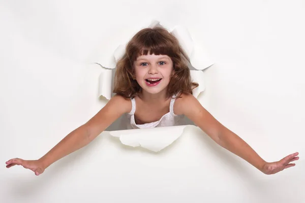 Menina bonita com espaço de cópia branca em um fundo branco — Fotografia de Stock