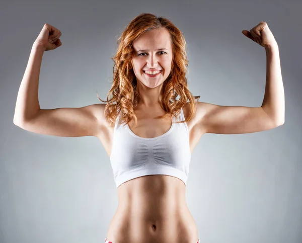 Athletic young woman. Isolated on white background Stock Image