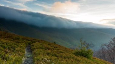Carpathians, Pylypets, Ukraine. Mountain cloud top view landscape. Timelapse of the Magura-Dzhide mountain range in the Carpathians from the air. Mount Gemba. Shipit Karpat. High quality 4k footage.