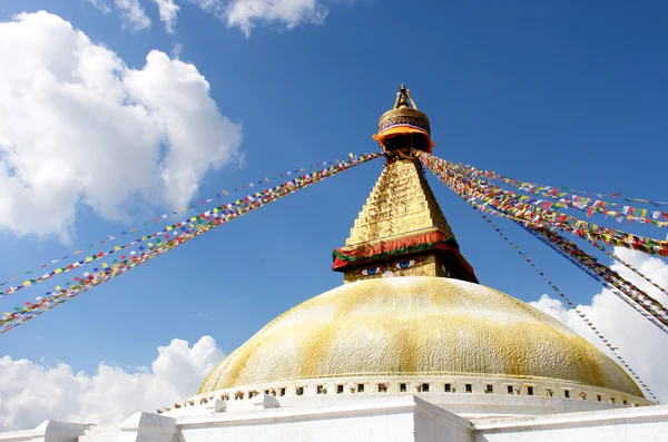 Stupa with buddha eyes and prayer flags on clear blue sky backgr — Stock Photo, Image
