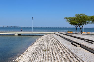 Parque das Nações footpath and Vasco da Gama bridge. Lisbon