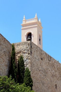 Torreón de la Peça ancient fortified wall and the tower bell o