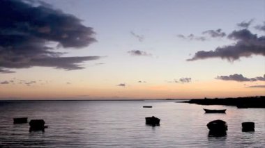 Sunset in Olhão da Restauração, a municipality and urban community in the Algarve region of southern Portugal and an important fishing port.