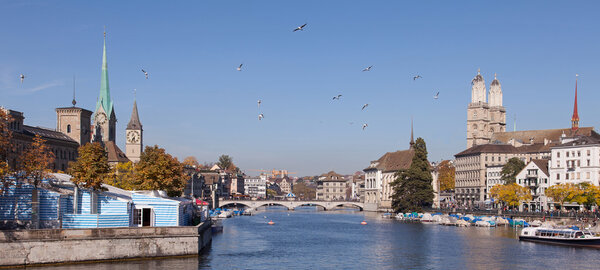 Zurich, Switzerland. View along the Limmat river with Oktoberfest 2013 tents on the left side.
