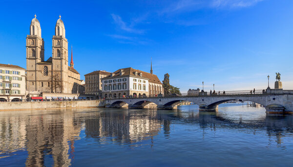 Zurich, the Great Minster cathedral and the Muensterbruecke bridge