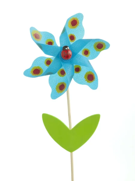 Hračka ve tvaru větrný mlýn květi — Stock fotografie