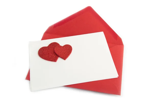 Lettere rosse su biglietto con cuori — Foto Stock