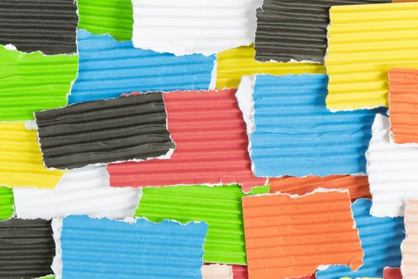 Bitar av färgat konstruktion papper — Stockfoto