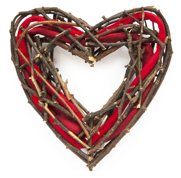 Heart-shaped christmas or St. Valentine wicker wreath — Stock Photo, Image