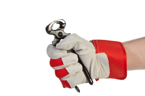มือด้วยถุงมือป้องกันถือ pincer — ภาพถ่ายสต็อก