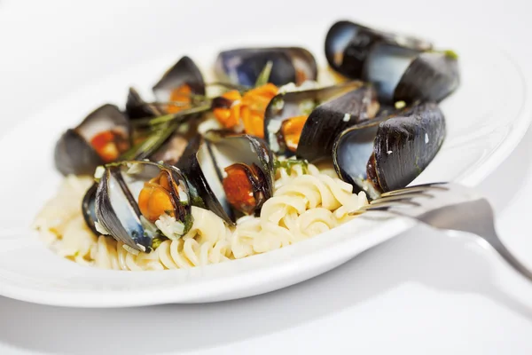 Seafood fussili pasta close-up — Stock Photo, Image