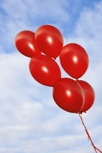 Red flying balloons on the sky background — Stock Photo, Image