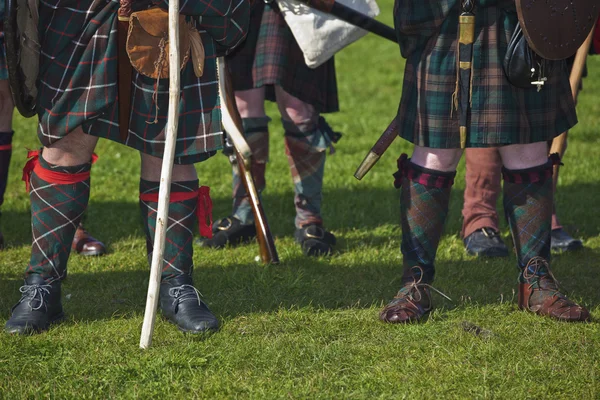 Lower part of medieval scottish warriors — Stock Photo, Image