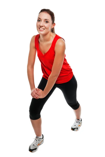 Giovane donna in forma esercizio fisico — Foto Stock