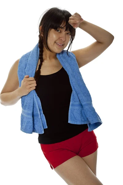 Pretty young Asian woman with towel after fitness — Stock Photo, Image