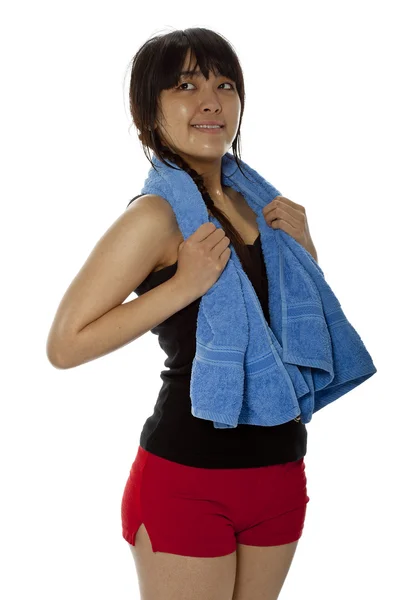 Pretty young Asian woman with towel after fitness — Stock Photo, Image