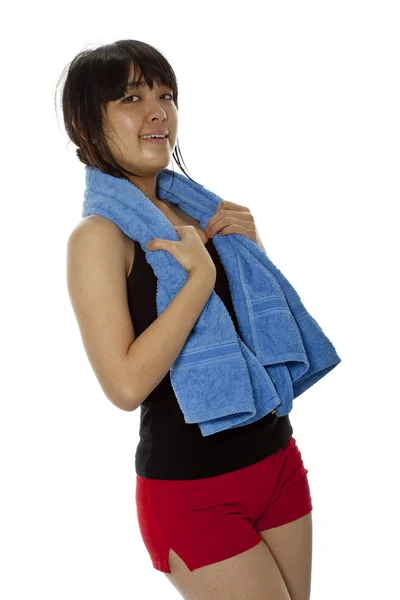 Pretty young Asian woman with towel after fitness — Stock Photo, Image