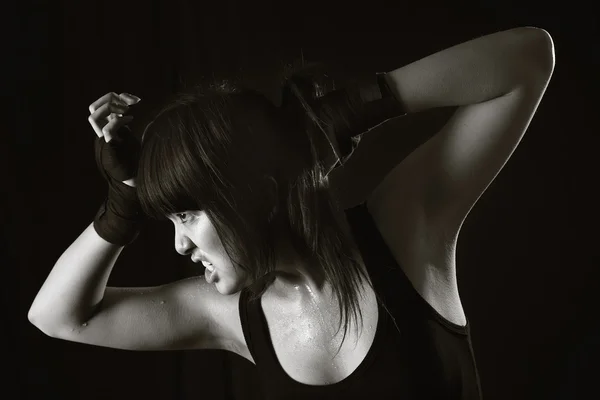 Perspiring Young Asian Woman working out. Monochromatic — Stock Photo, Image