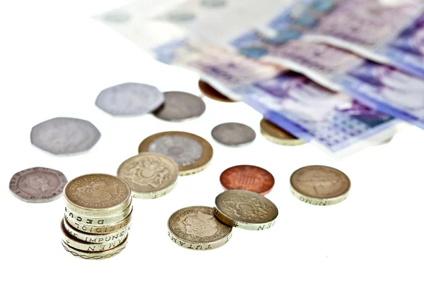 Billetes y monedas en libras esterlinas del Reino Unido —  Fotos de Stock