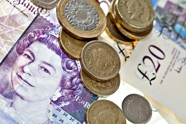 Nagy-Britannia font bankjegyek és érmék — Stock Fotó