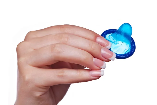 Hand holding a condom — Stock Photo, Image